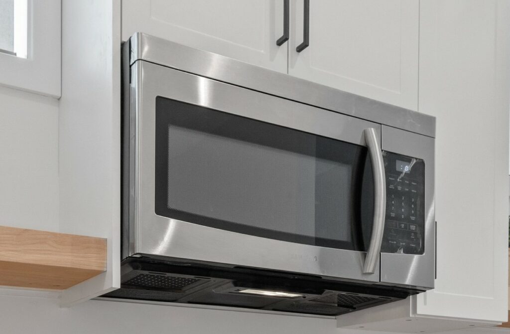 How do I stop my microwave from making loud buzzing noise