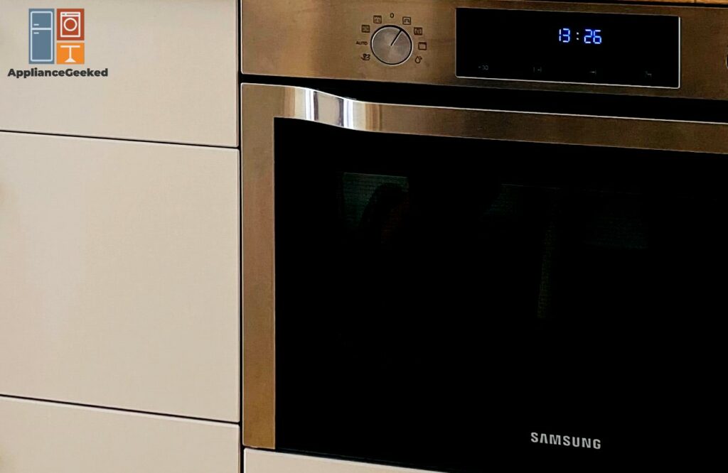 Why does my Samsung oven smell like burning plastic